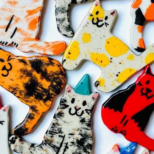 handmade ceramic cat magnets by RollingDesigns